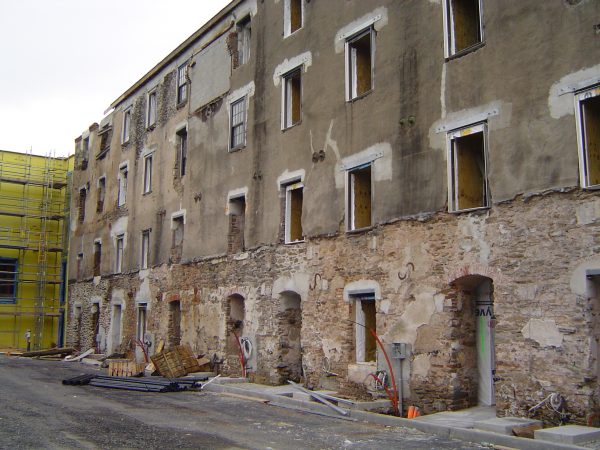 Run-down building prior to applying structural skin